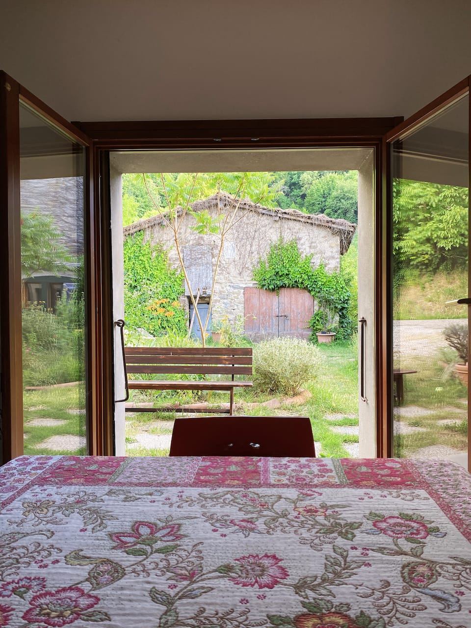 View of the old barn and bench from the kitchen doors